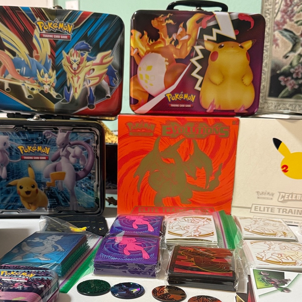 Colorful Pokémon Collectible Tins and Cards